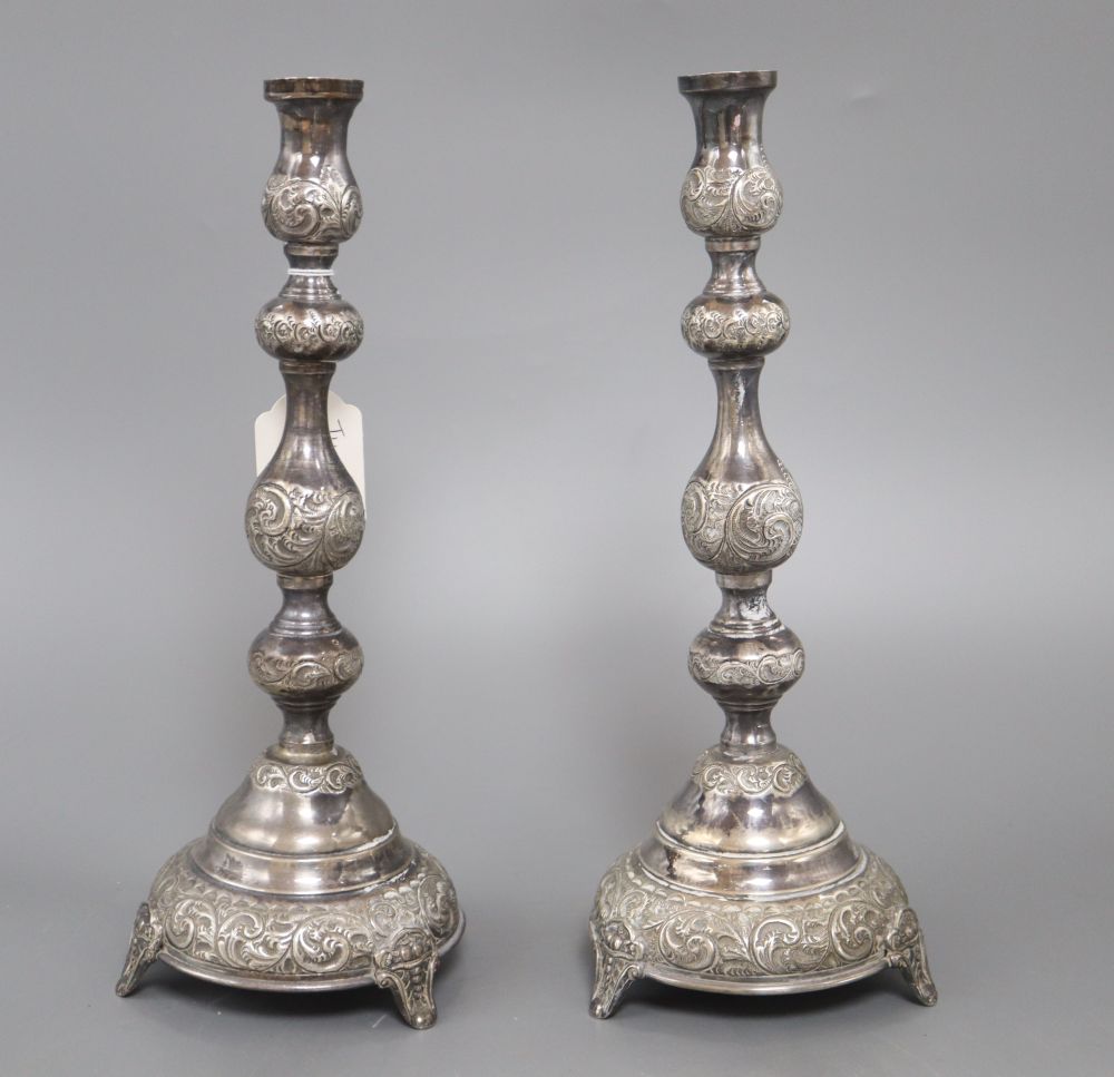 A pair of George V silver Sabbath Day candlesticks by J. Zeving, London, 1920, 30.2cm, weighted, no sconces.